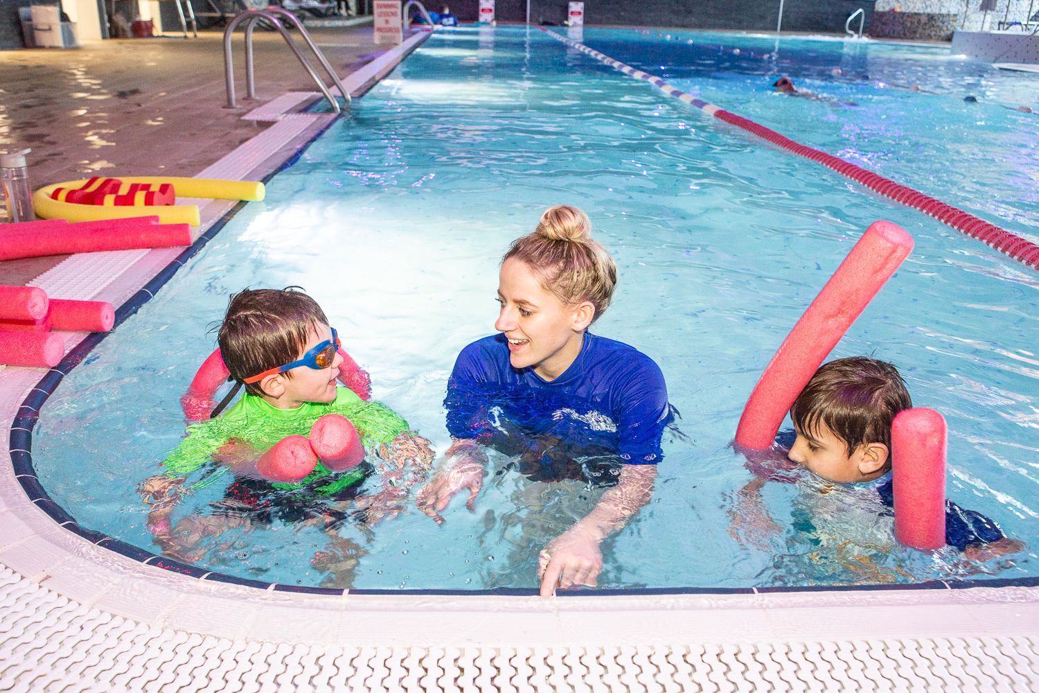 Swimtime instructor demonstrating key skills in group lesson