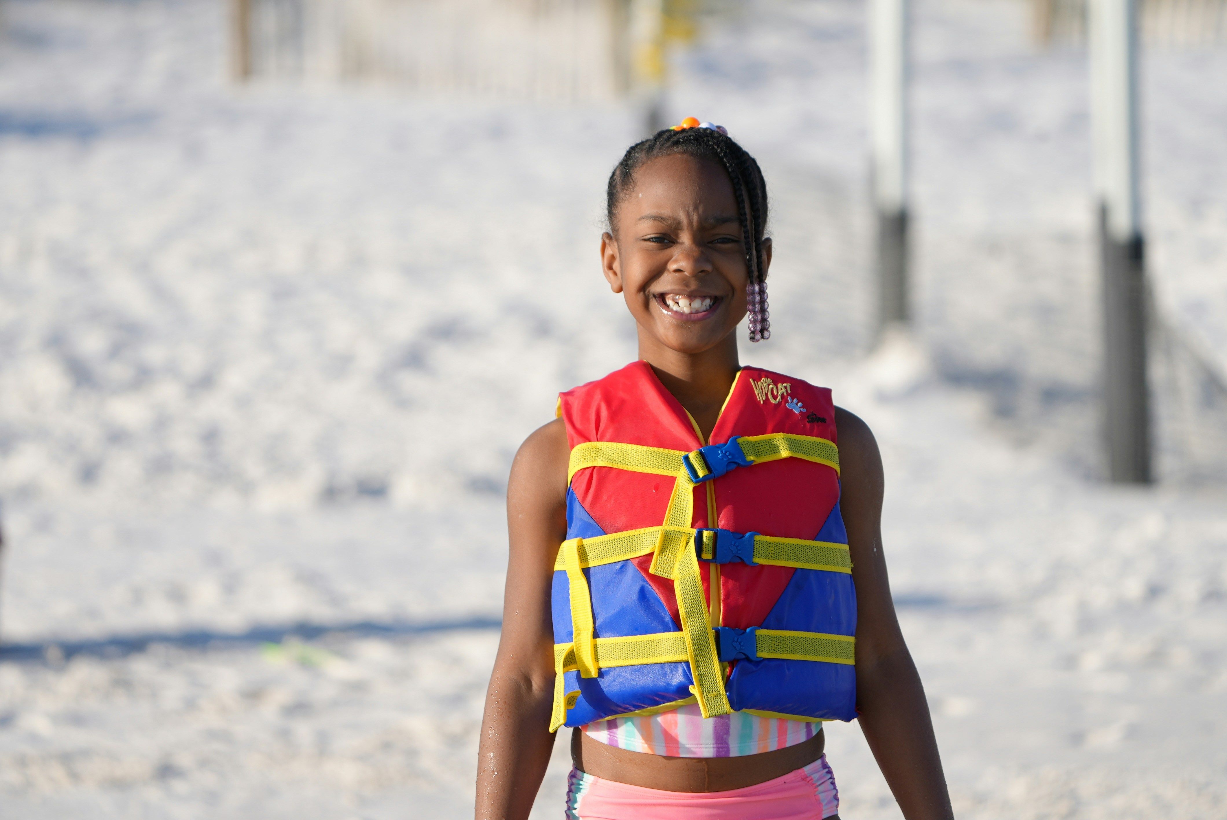 Child wearing life vest