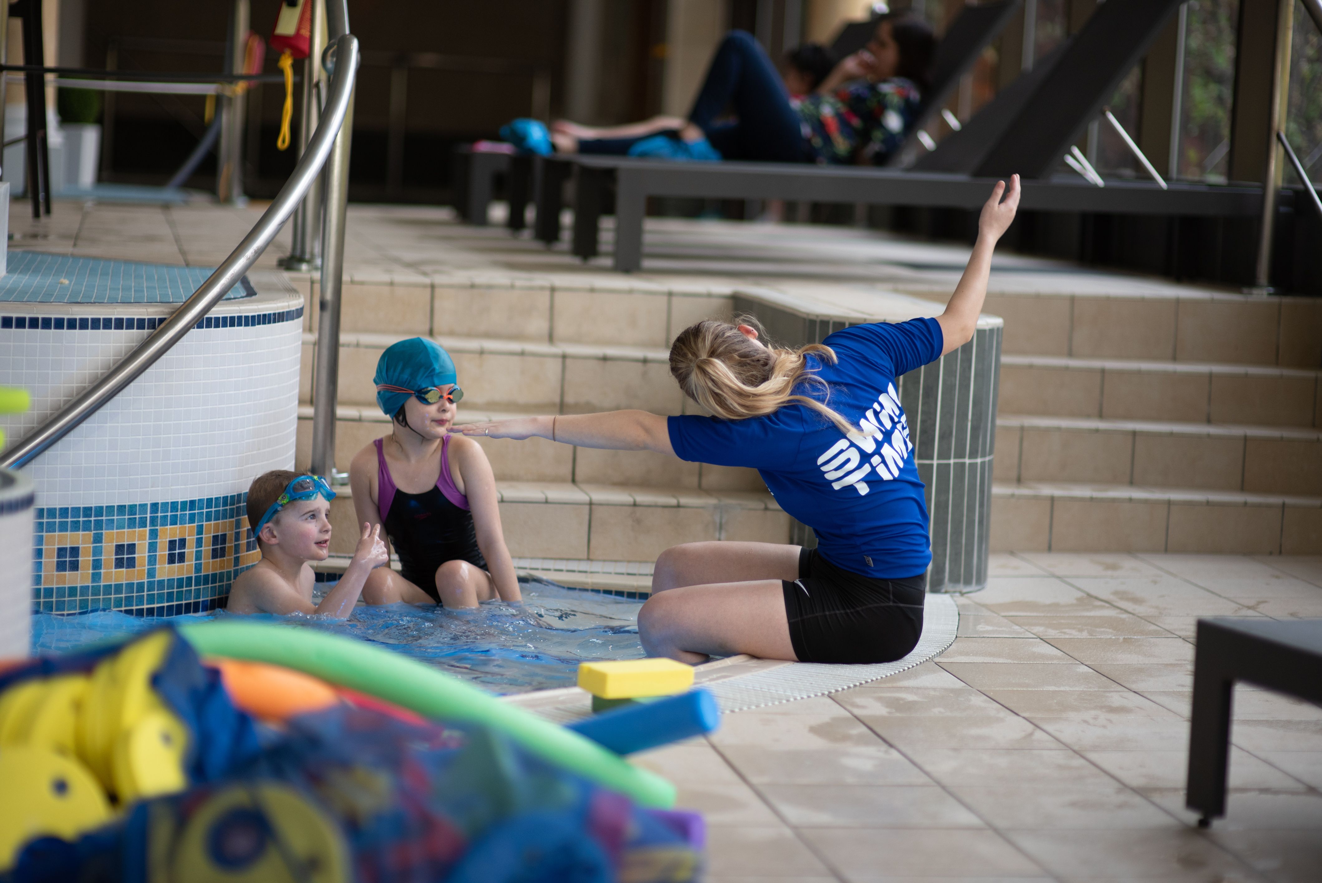 Instructor demonstrating to children